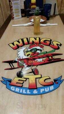 Wings Etc.