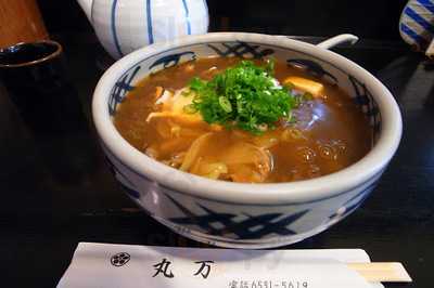 丸万