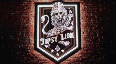 ‪tipsy Lion‬